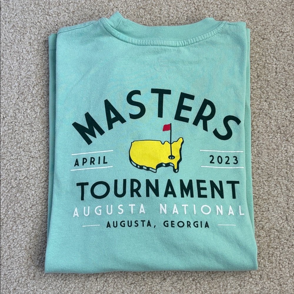 Men’s Masters Tournament tshirt, size Medium. Note small flaws as shown.